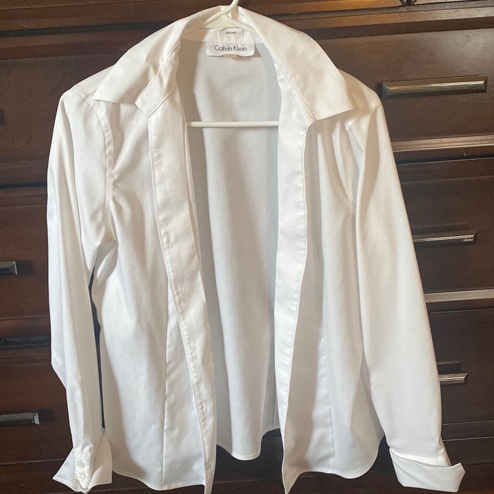 Calvin Klein women’s white button up shirt.